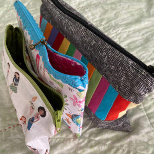 Three zipper pouches
