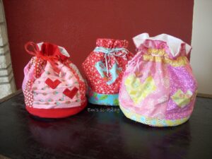 Three Valentine themed drawstring bags