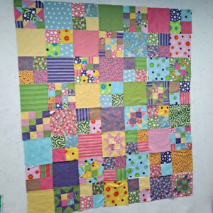 quilt blocks on design wall
