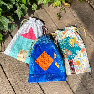 Three scrappy drawstring bags