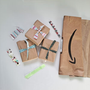 Gifts wrapped in recycled paper and fabric scraps.