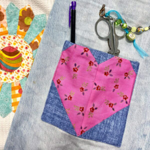 Patchwork hear pocket on jeans
