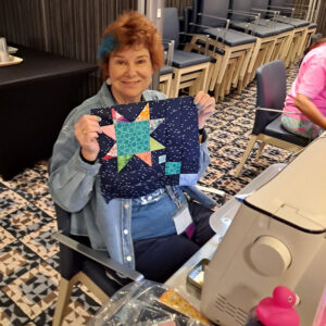 Quilter with star quilt block