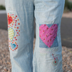 Upcycled jeans with pocket, applique and visible mending