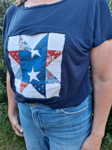 Upcycled T-shirt with scrappy star quilt block