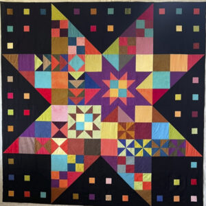 Modern jumbo scrappy star quilt in solids