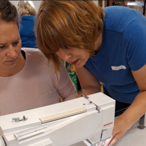 Experienced quilter helping a beginner